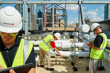 Aramark employees in white hard hats